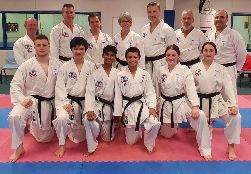 Black belt grading examiners and participants